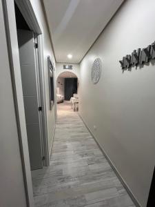a hallway leading to a room with a tile floor at Sweet home ocean golf resort in San Miguel de Abona