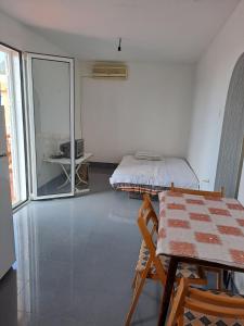 Postel nebo postele na pokoji v ubytování Villa Peonia