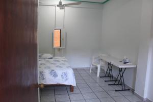 Postel nebo postele na pokoji v ubytování Hotel Gamito