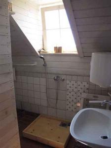 a bathroom with a sink and a window at Studio in Novo mesto - dostava - Kranjska Krain 26035 