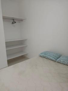 Кровать или кровати в номере Sol Nascente Apartamentos - Pontal do Sul