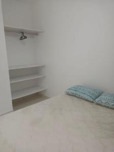 Postel nebo postele na pokoji v ubytování Sol Nascente Apartamentos - Pontal do Sul