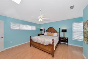 Letto o letti in una camera di Siesta-Retreats - Key West Unit