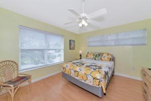 Letto o letti in una camera di Siesta-Retreats - Key West Unit