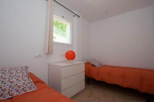 Posteľ alebo postele v izbe v ubytovaní Aparthotel l'Heretat