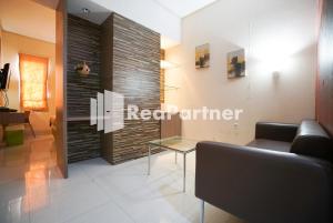 Fotografie z fotogalerie ubytování Tirta Mansion Lippo Karawaci Mitra RedDoorz v destinaci Karawaci