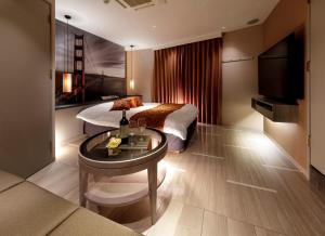Μια τηλεόραση ή/και κέντρο ψυχαγωγίας στο Hotel Cocoon -Urban Luxury-