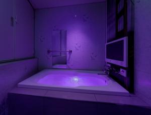 Ένα μπάνιο στο Hotel Cocoon -Urban Luxury-