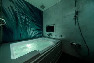 Ένα μπάνιο στο Hotel Cocoon -Urban Luxury-