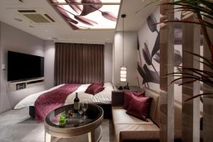 Μια τηλεόραση ή/και κέντρο ψυχαγωγίας στο Hotel Cocoon -Urban Luxury-