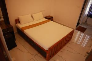 Giường trong phòng chung tại Calais7