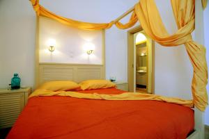 Letto o letti in una camera di Aigaio Studios tinos