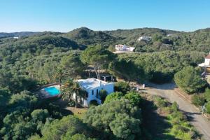 an aerial view of a house in the hills at Luxurious Refuge in National Park on Island - heated Pool - 5 minutes to Ocean in Mahón