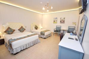 TV a/nebo společenská místnost v ubytování Royal Park Resort Boracay