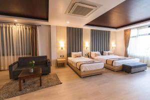 Tempat tidur dalam kamar di Lavie Residence and Spa