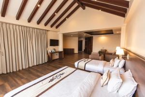 Tempat tidur dalam kamar di Lavie Residence and Spa