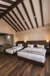 Tempat tidur dalam kamar di Lavie Residence and Spa