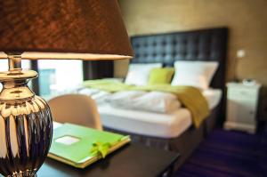 Postel nebo postele na pokoji v ubytování Hotel zum See garni