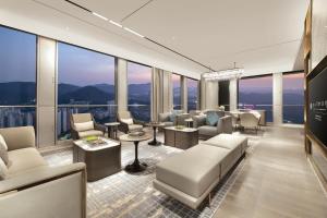 a hotel lobby with a view of the city at Pullman Shenzhen North in Shenzhen