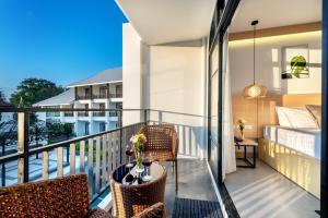 Balkón nebo terasa v ubytování Ai Pai Hotel + 37 fotografií