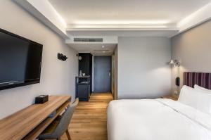 Krevet ili kreveti u jedinici u okviru objekta River Inn Kenting