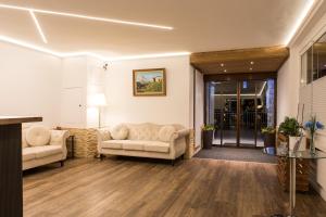 Posezení v ubytování Hotel Beau Rivage