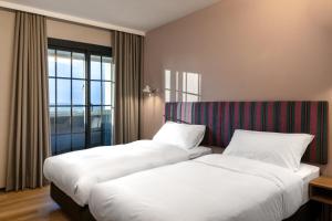Krevet ili kreveti u jedinici u okviru objekta River Inn Kenting