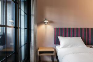 Krevet ili kreveti u jedinici u okviru objekta River Inn Kenting