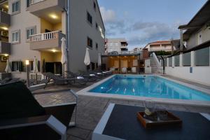 Bazén v ubytovaní Villa Tećo - Moderne Apartments mit Pool und Meerblick alebo v jeho blízkosti