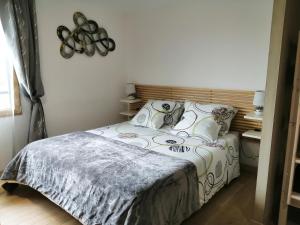 Postel nebo postele na pokoji v ubytování Homgaïa chambres d'hôtes