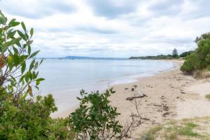 a view of a beach with trees and the water at 124 Modern 2Bed (21sq) in heart of Sorrento in Sorrento
