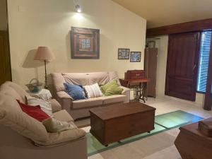 A seating area at Casa Rural Les Caixes