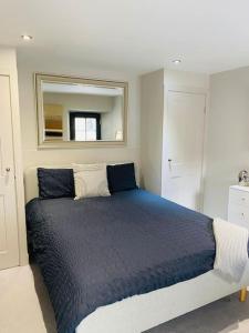 En eller flere senge i et værelse på Contemporary Luxury Barn Conversion in County Durham