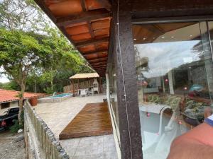 Baseinas apgyvendinimo įstaigoje Casa ferradura com piscina e hidromassagem arba netoliese