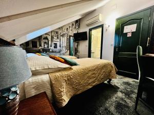Postelja oz. postelje v sobi nastanitve Hotel Villa Diana