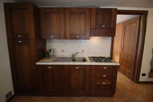 Kuchyň nebo kuchyňský kout v ubytování Residence Aquila - Bilo Mont Nery