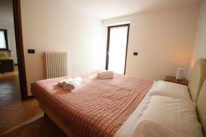 Postel nebo postele na pokoji v ubytování Residence Aquila - Bilo Mont Nery