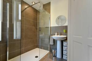 a bathroom with a shower and a sink at Alnbank in Alnmouth