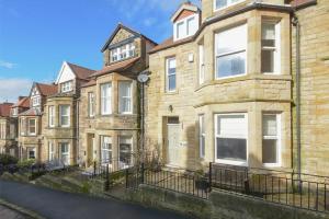 a row of houses on a city street at Alnbank in Alnmouth