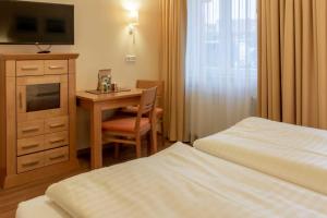 Ένα ή περισσότερα κρεβάτια σε δωμάτιο στο Hafendomicil Appartement WH05 - Maus