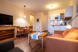 Kuchyň nebo kuchyňský kout v ubytování Hafendomicil Appartement WH12 - Specht