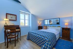 Postel nebo postele na pokoji v ubytování Mare Mare Suites + 37 fotografií