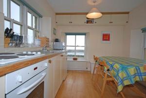 Kuchyň nebo kuchyňský kout v ubytování Snook Point Cottage + 3 fotografie