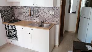 Kuchyň nebo kuchyňský kout v ubytování Apartman Novalja