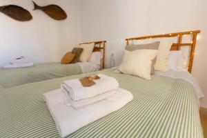 Postel nebo postele na pokoji v ubytování Casa Damasco