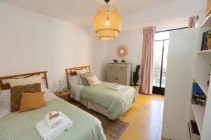 Postel nebo postele na pokoji v ubytování Casa Damasco