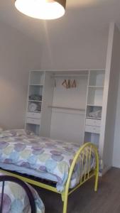 Ein Bett oder Betten in einem Zimmer der Unterkunft Villa au sein d'un élevage de Chevaux