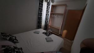 Postel nebo postele na pokoji v ubytování Apartman Novalja