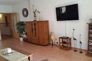 Televisyen dan/atau pusat hiburan di Haus am Kölpinsee App 1 4 +18 gambar
