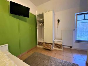 Televisyen dan/atau pusat hiburan di Haus am Kölpinsee App 4 4 +24 gambar